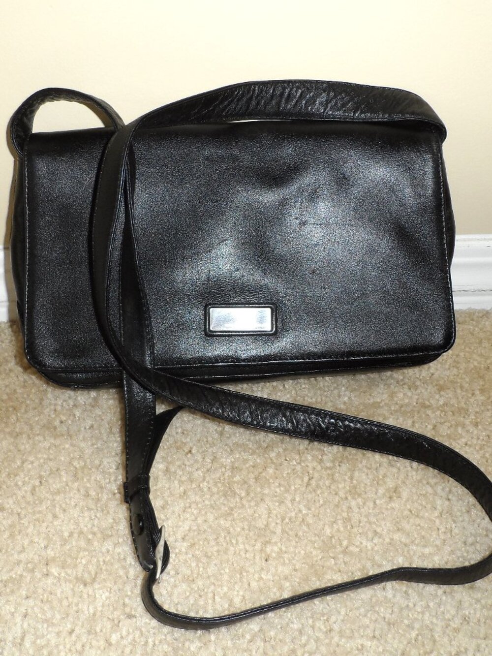 Derek Alexander leather crossbody bag with metal logo plate